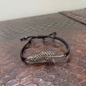 Tai feather bracelet